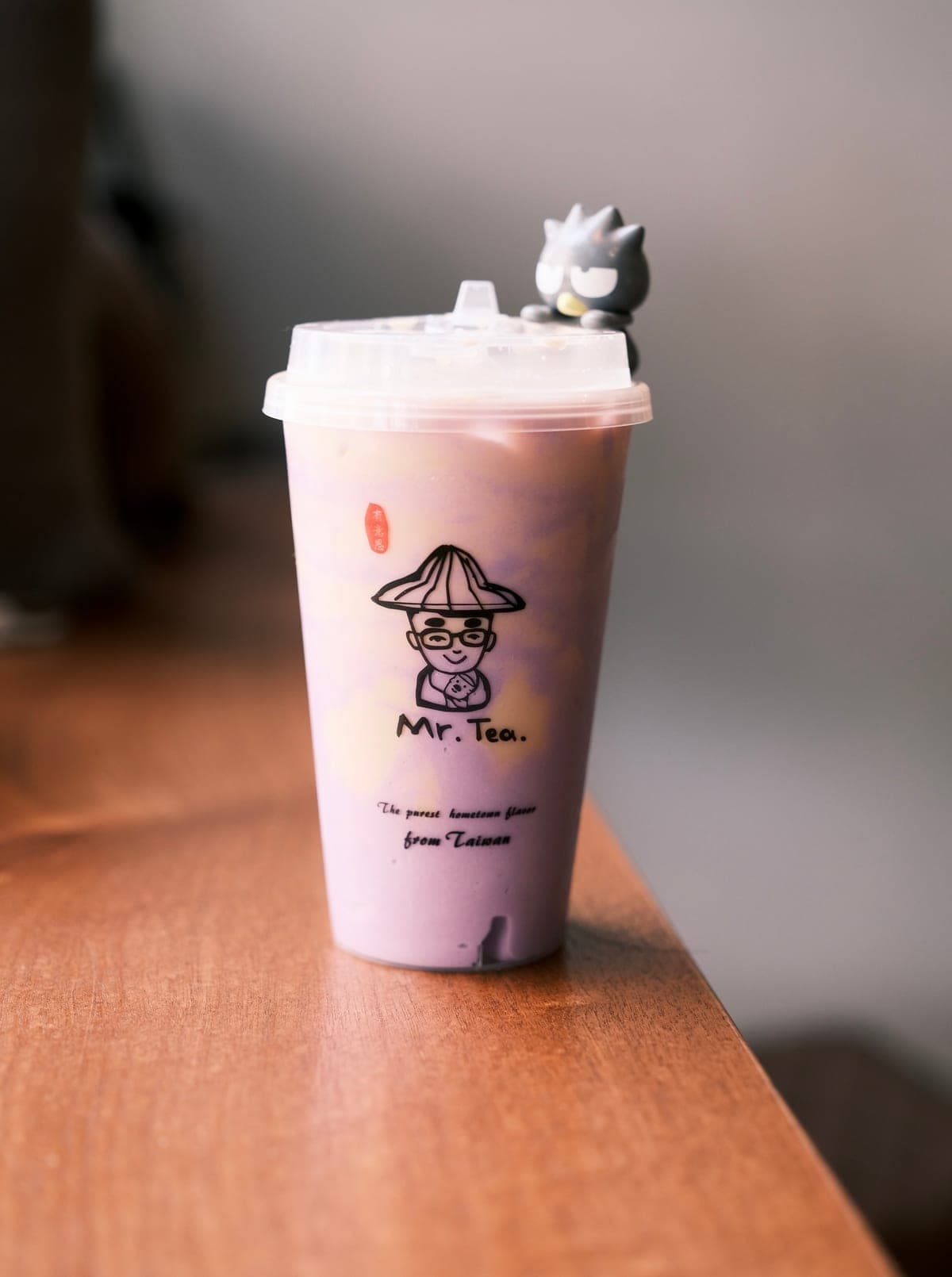 A cup of Mr Tea taro paste latte in soft lilac, made with real steamed taro and fresh milk